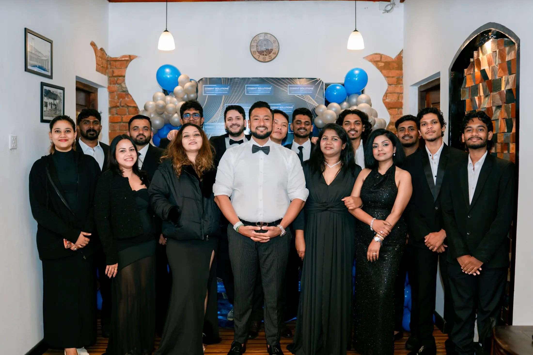 Cogent Solutions team gathered together at a company event