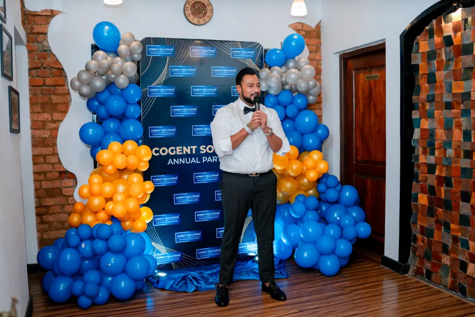 Cogent Solutions team receiving Best Workplace recognition