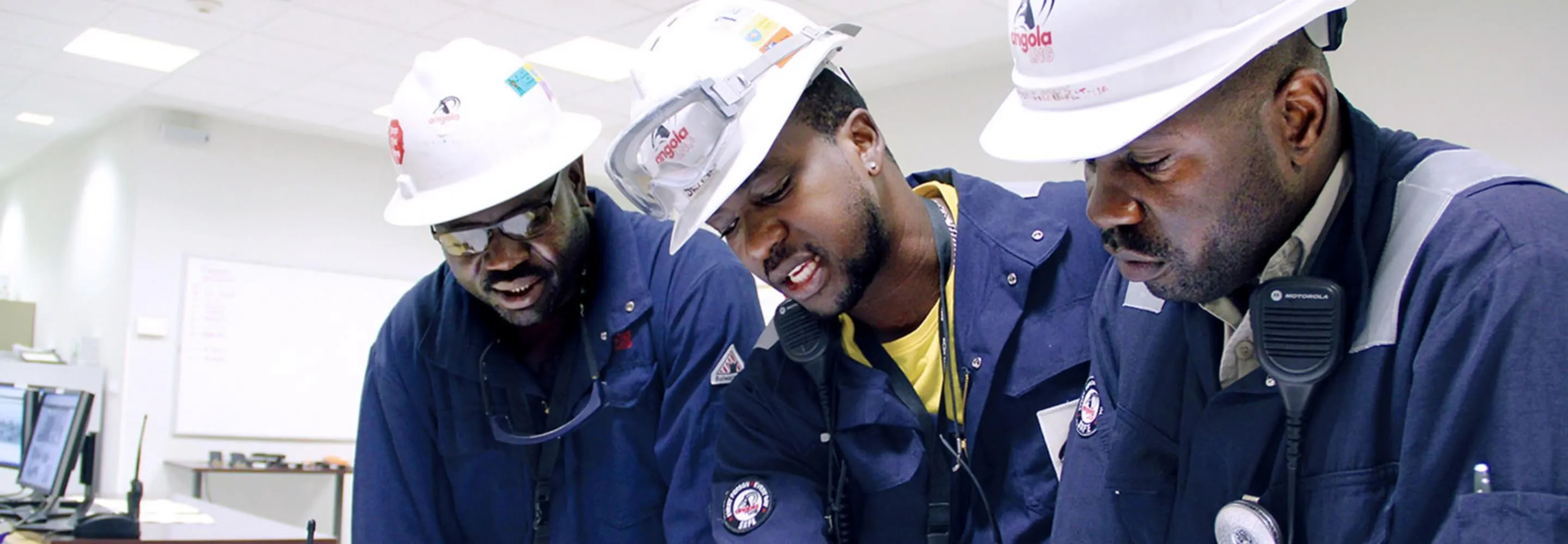 Angola LNG technical team reviewing work together at its Soyo facility